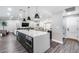 Modern kitchen with spacious island, stainless steel appliances, and contemporary design at 5975 E Larkspur Dr, Scottsdale, AZ 85254