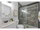 Modern bathroom featuring a glass enclosed shower, stylish tile, and contemporary fixtures at 6009 N 79Th St, Scottsdale, AZ 85250