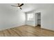 Bright bedroom with a ceiling fan, natural light, and ample space creating a comfortable atmosphere at 6009 N 79Th St, Scottsdale, AZ 85250