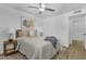 Comfortable bedroom featuring soft lighting, stylish decor, and a ceiling fan for added comfort at 6009 N 79Th St, Scottsdale, AZ 85250