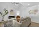 Bright living room features vaulted ceiling, modern fireplace and stylish decor at 6009 N 79Th St, Scottsdale, AZ 85250