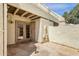 Back patio featuring brick and stone pavers and access to the interior of the home at 6009 N 79Th St, Scottsdale, AZ 85250