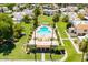 Aerial view of a pristine community pool area featuring manicured landscaping and clear, blue water at 6009 N 79Th St, Scottsdale, AZ 85250