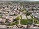 Aerial view showcases a neighborhood park with playground and sports courts at 6228 S Nash Way, Chandler, AZ 85249