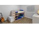 Cozy bedroom featuring bunk beds, neutral walls, and a window, providing a comfortable and functional space at 6228 S Nash Way, Chandler, AZ 85249