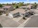 Aerial view of a single-story home in a neighborhood featuring a desert landscape and tile roof at 6228 S Nash Way, Chandler, AZ 85249
