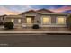 Charming single-story home featuring a neutral stucco exterior, tiled roof, and tidy landscaping at 6228 S Nash Way, Chandler, AZ 85249