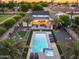 Expansive backyard boasts a sparkling pool, putting green, outdoor seating, and a firepit for memorable entertaining at 6301 N 16Th Dr, Phoenix, AZ 85015