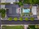 Aerial view showcases a backyard oasis, featuring a pool, spa, sport court, and manicured landscaping for luxury living at 6301 N 16Th Dr, Phoenix, AZ 85015