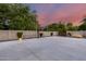 Full basketball court offers a recreational space perfect for outdoor activities with dusk skies in the background at 6301 N 16Th Dr, Phoenix, AZ 85015