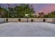 Well-maintained basketball court provides outdoor recreation opportunity against a backdrop of a dusky sky at 6301 N 16Th Dr, Phoenix, AZ 85015
