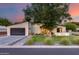 Modern home exterior with a sleek design, clean lines, and desert landscaping, creating curb appeal at 6301 N 16Th Dr, Phoenix, AZ 85015