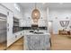 Bright modern kitchen with a large island, modern appliances, and open design at 6301 N 16Th Dr, Phoenix, AZ 85015