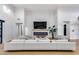 Spacious living room with stylish decor, fireplace, hardwood floors, and ample natural light at 6301 N 16Th Dr, Phoenix, AZ 85015