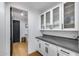 Well-organized pantry with sleek cabinets and ample counter space, offering efficient storage and modern design at 6301 N 16Th Dr, Phoenix, AZ 85015