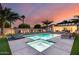 Gorgeous backyard pool and spa with desert landscaping, perfect for outdoor entertaining at dusk at 6301 N 16Th Dr, Phoenix, AZ 85015