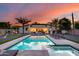 Beautiful pool area with a jacuzzi, lounge chairs, and putting green, perfect for relaxation and entertainment at 6301 N 16Th Dr, Phoenix, AZ 85015