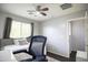 Bedroom with a daybed, desk, ceiling fan, carpet, and gray walls at 6749 W Charter Oak Rd, Peoria, AZ 85381