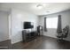 Bonus room featuring laminate wood flooring and gray walls at 6749 W Charter Oak Rd, Peoria, AZ 85381