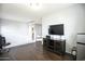 Bonus room featuring laminate wood flooring and gray walls at 6749 W Charter Oak Rd, Peoria, AZ 85381
