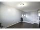 Bonus room featuring laminate wood flooring and gray walls at 6749 W Charter Oak Rd, Peoria, AZ 85381