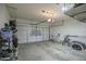 A spacious garage with ample storage racks and shelving throughout at 6749 W Charter Oak Rd, Peoria, AZ 85381