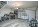 A well-lit garage with ample storage, offering a functional and organized space at 6749 W Charter Oak Rd, Peoria, AZ 85381