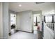 Hallway with dark floors featuring access to bedrooms and an overhead air vent at 6749 W Charter Oak Rd, Peoria, AZ 85381