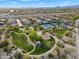 Aerial view of a community park with tennis courts and playground at 7354 E Norwood St, Mesa, AZ 85207