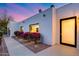 Modern home exterior featuring a sleek design and beautiful landscaping at 7820 N 5Th Ave, Phoenix, AZ 85021