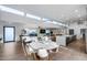 Open concept great room connects the dining, kitchen, and living areas for easy flow and entertaining at 7820 N 5Th Ave, Phoenix, AZ 85021