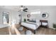 The main bedroom offers wood flooring and ample closet space at 7820 N 5Th Ave, Phoenix, AZ 85021