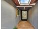 Welcoming entryway featuring a tiled floor, wood accents, and a clear view into the living space at 8229 E Devonshire Ave, Scottsdale, AZ 85251