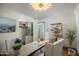 Bright office featuring a desk, chairs, and view to the closet at 8229 E Devonshire Ave, Scottsdale, AZ 85251