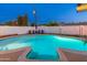 Large backyard pool is ideal for relaxation with lounge seating and a serene, fenced-in area at 8431 E Rose Ln, Scottsdale, AZ 85250