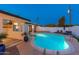 Sparkling pool surrounded by a spacious deck, perfect for swimming, sunbathing, and outdoor entertainment at 8431 E Rose Ln, Scottsdale, AZ 85250