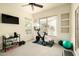 Bright workout space with large windows and exercise equipment at 10040 E Happy Valley Rd # 2022, Scottsdale, AZ 85255