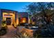 Elegant front patio with desert landscaping and stylish outdoor seating at 10040 E Happy Valley Rd # 2022, Scottsdale, AZ 85255