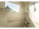 Walk-in shower featuring a rainfall shower head, a handheld sprayer, and mountain views at 10040 E Happy Valley Rd # 2022, Scottsdale, AZ 85255