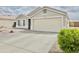 Charming single-story home with a well-maintained driveway and attached two-car garage at 1005 W 19Th Ave, Apache Junction, AZ 85120