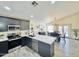 Beautiful open kitchen with stainless steel appliances and a bright, airy dining area, perfect for modern living at 1005 W 19Th Ave, Apache Junction, AZ 85120