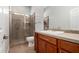 Bathroom featuring vanity and glass shower at 1123 E Buckingham Ave, Gilbert, AZ 85297