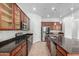 Spacious kitchen with stainless appliances, granite counters, and ample cabinet space at 1123 E Buckingham Ave, Gilbert, AZ 85297