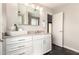 Bathroom featuring granite countertop, vanity with ample storage, and bright lighting at 1237 E Gemini Dr, Tempe, AZ 85283