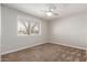 Bedroom featuring neutral decor and ceiling fan at 1237 E Gemini Dr, Tempe, AZ 85283