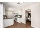 Modern kitchen features white cabinetry and stainless steel appliances at 1237 E Gemini Dr, Tempe, AZ 85283