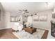Bright living room featuring a ceiling fan, decor, and comfortable seating at 1237 E Gemini Dr, Tempe, AZ 85283