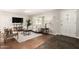 Bright and airy living room with wood floors, a large window, and neutral decor at 1237 E Gemini Dr, Tempe, AZ 85283