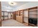 Spacious walk-in closet with custom wood shelving and drawers for optimal storage and organization at 12620 N 70Th St, Scottsdale, AZ 85254