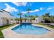 Backyard pool with palm trees, a jacuzzi and lush landscaping offers a private and relaxing retreat at 12620 N 70Th St, Scottsdale, AZ 85254